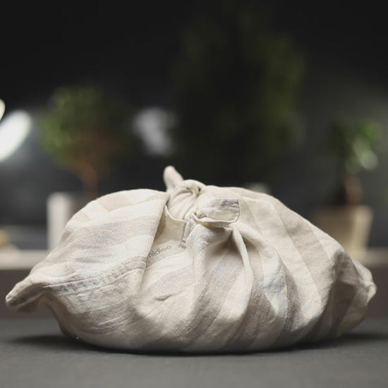  A Short Video Clip Where A Girl is Untying The Linen Bread Bento Bag And Taking Out the Bread